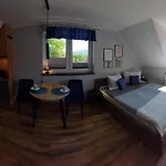 Δωμάτια σε οικογενειακή κατοικία Pod Lasem